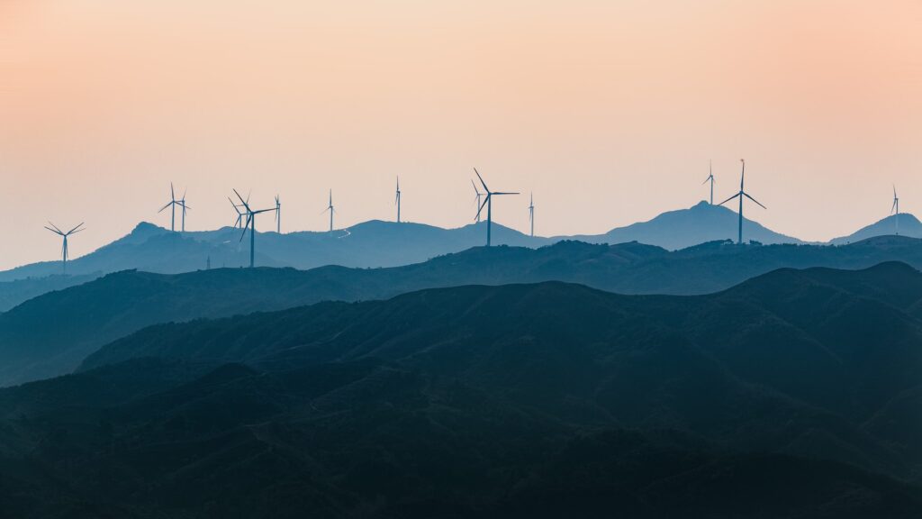 wind turbines at sunset