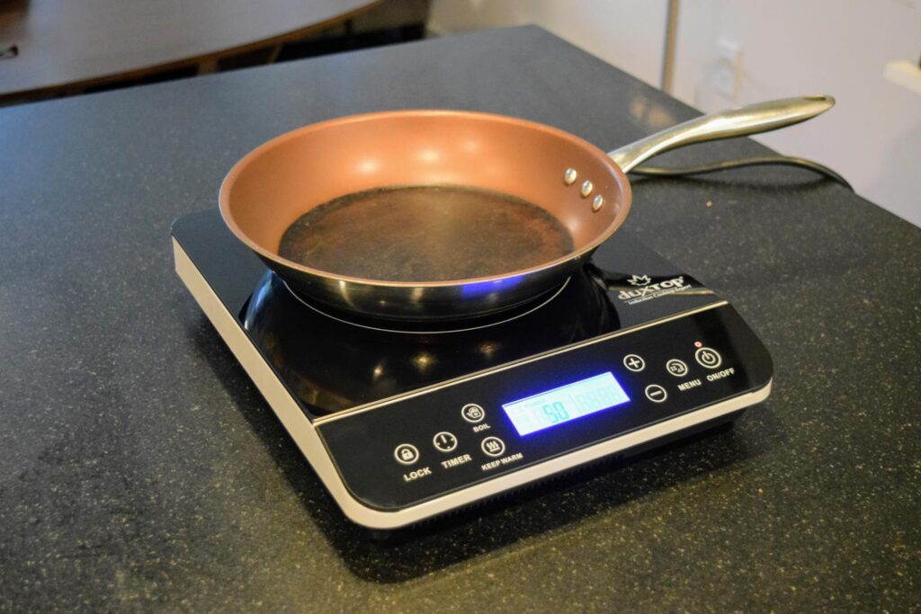 Non-stick pan on a portable induction cooktop